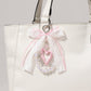 Blue Ribbon Keychain with Pearl Bow and Iridescent Beaded Star Charms
