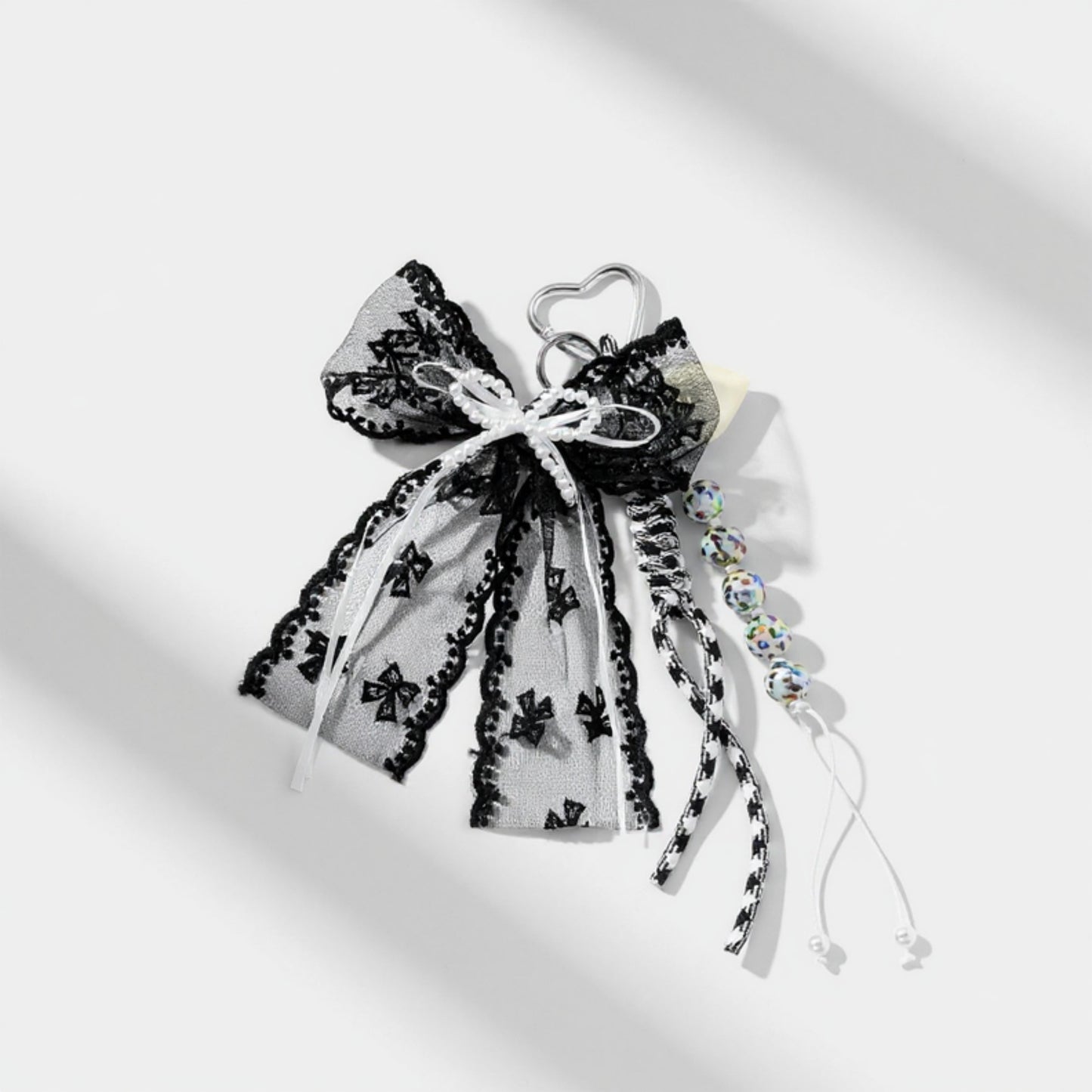 Black Lace Bow Keychain with Heart Clasp and Beaded Ribbon Details