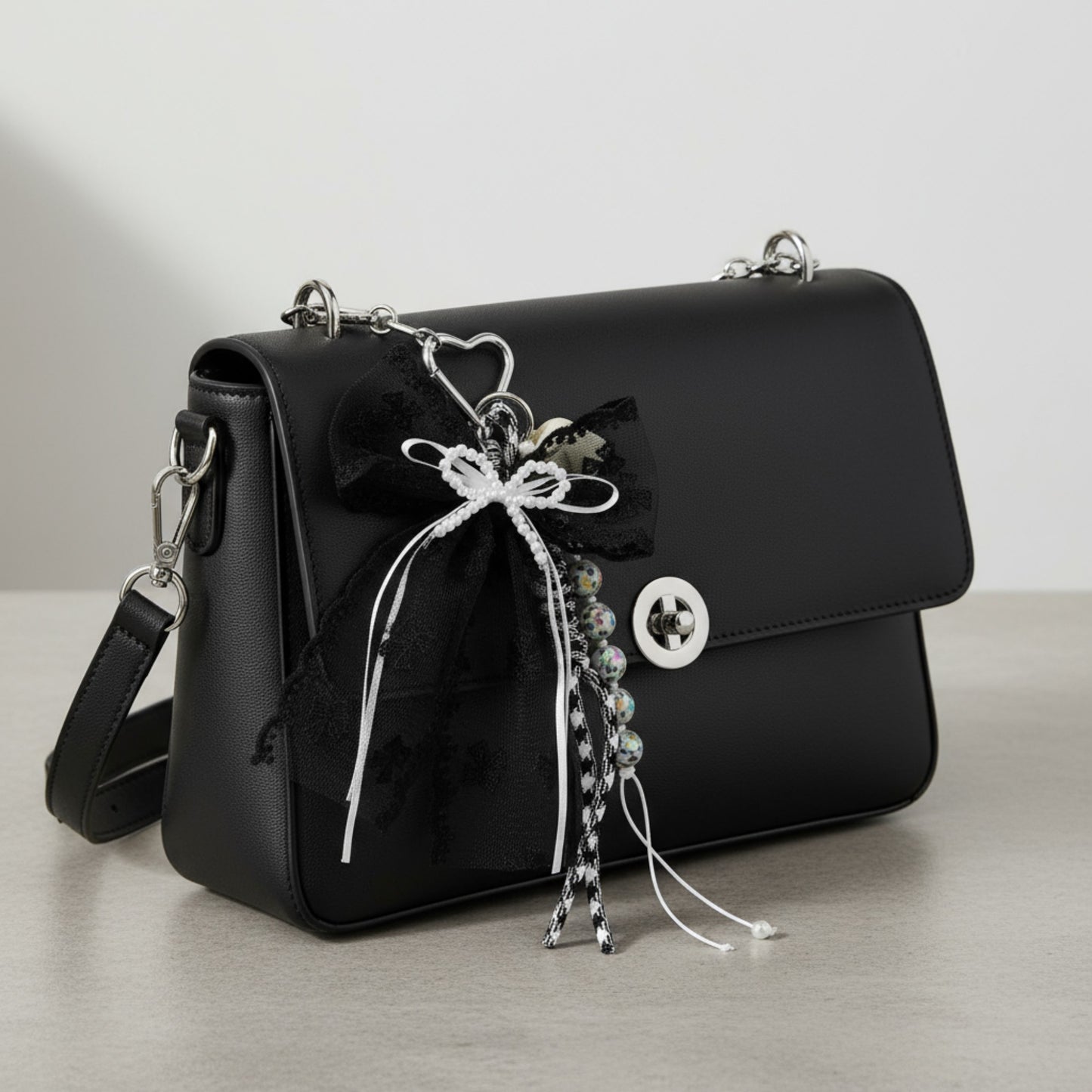 Black Lace Bow Keychain with Heart Clasp and Beaded Ribbon Details