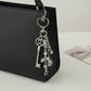 Silver Heart Keychain with Moon, Star, and Bow Charms