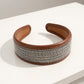 Textured Fabric Headband with Oversized Acrylic Ring Accent 6.3x4.7x1.2in