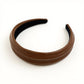 Textured Fabric Headband with Oversized Acrylic Ring Accent 6.3x4.7x1.2in