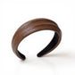 Textured Fabric Headband with Oversized Acrylic Ring Accent 6.3x4.7x1.2in