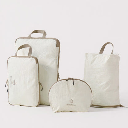 4-Piece Travel Packing Cube Set with Handles and Zip Closures for Organized Luggage Storage