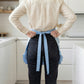 Gingham Kitchen Apron with Ruffle Trim Adjustable Waist Ties Bow Pocket Details and Front Coverage