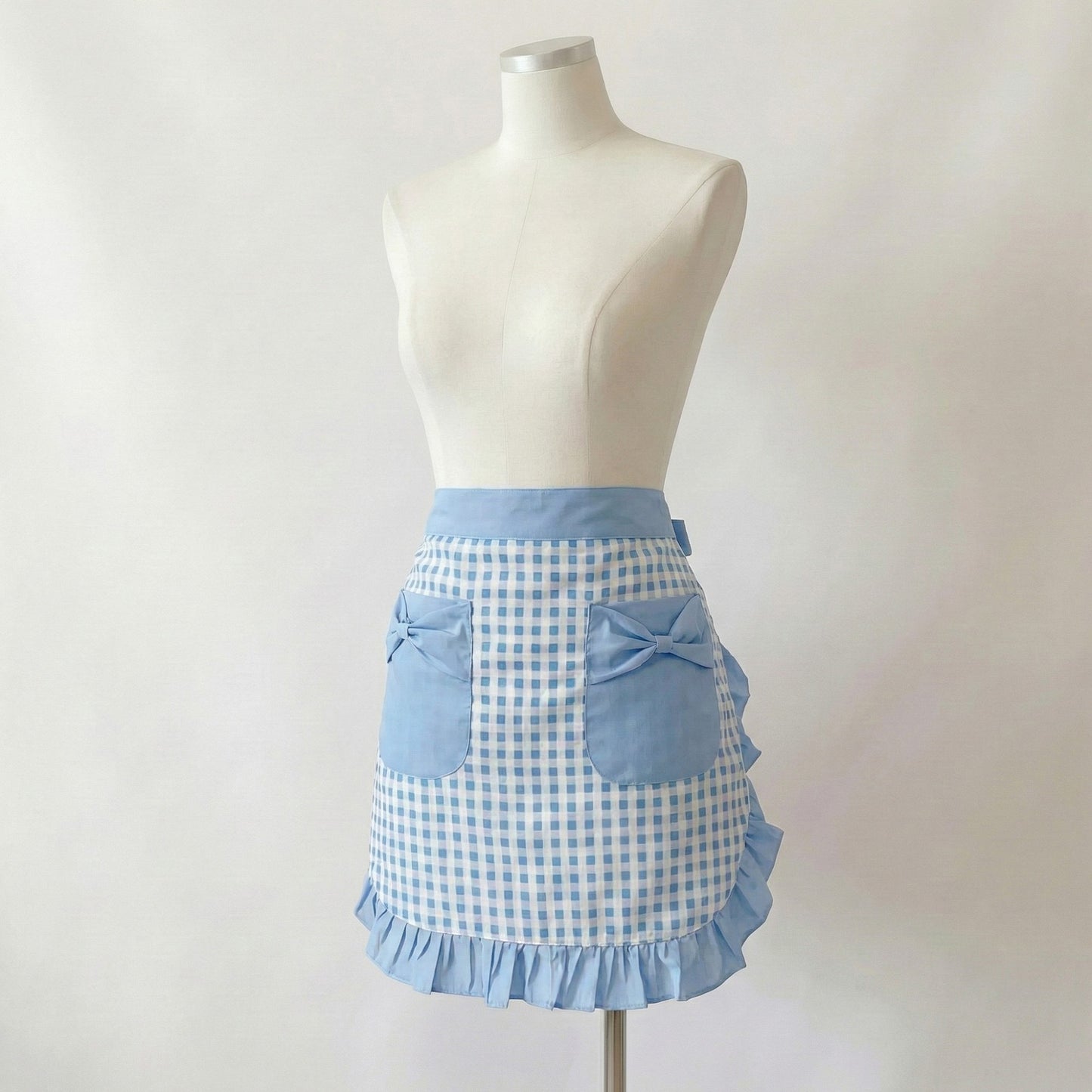 Gingham Kitchen Apron with Ruffle Trim Adjustable Waist Ties Bow Pocket Details and Front Coverage