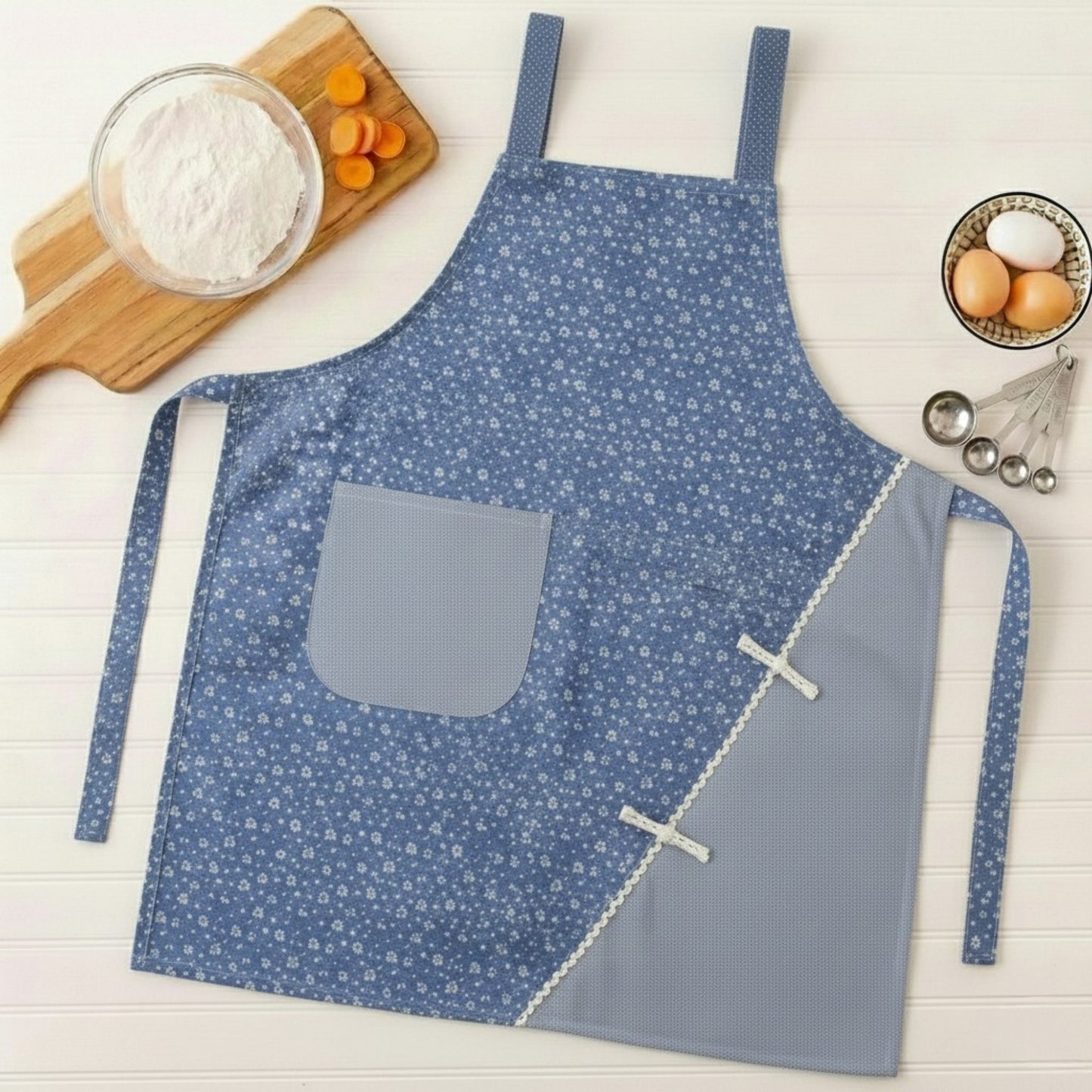 Floral Pattern Kitchen Apron with Adjustable Shoulder Straps Front Pocket and Decorative Trim Detail