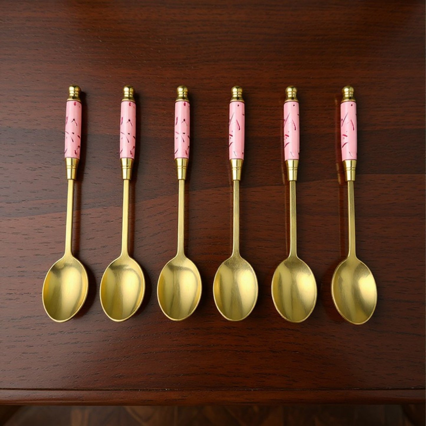 Decorative Teaspoon Set with Gold Tone Finish and Patterned Handle Design