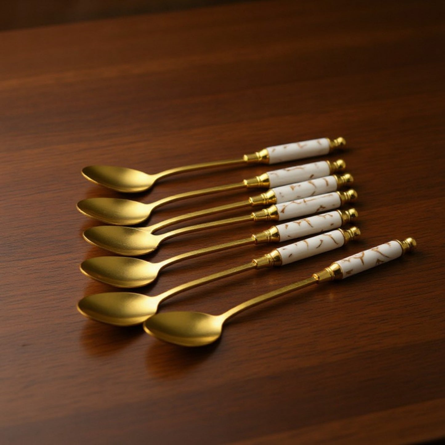 Decorative Teaspoon Set with Gold Tone Finish and Patterned Handle Design