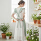 Lace Trim Ruffle Kitchen Apron with Embroidered Bib Detail Dual Front Pockets and Adjustable Waist Ties