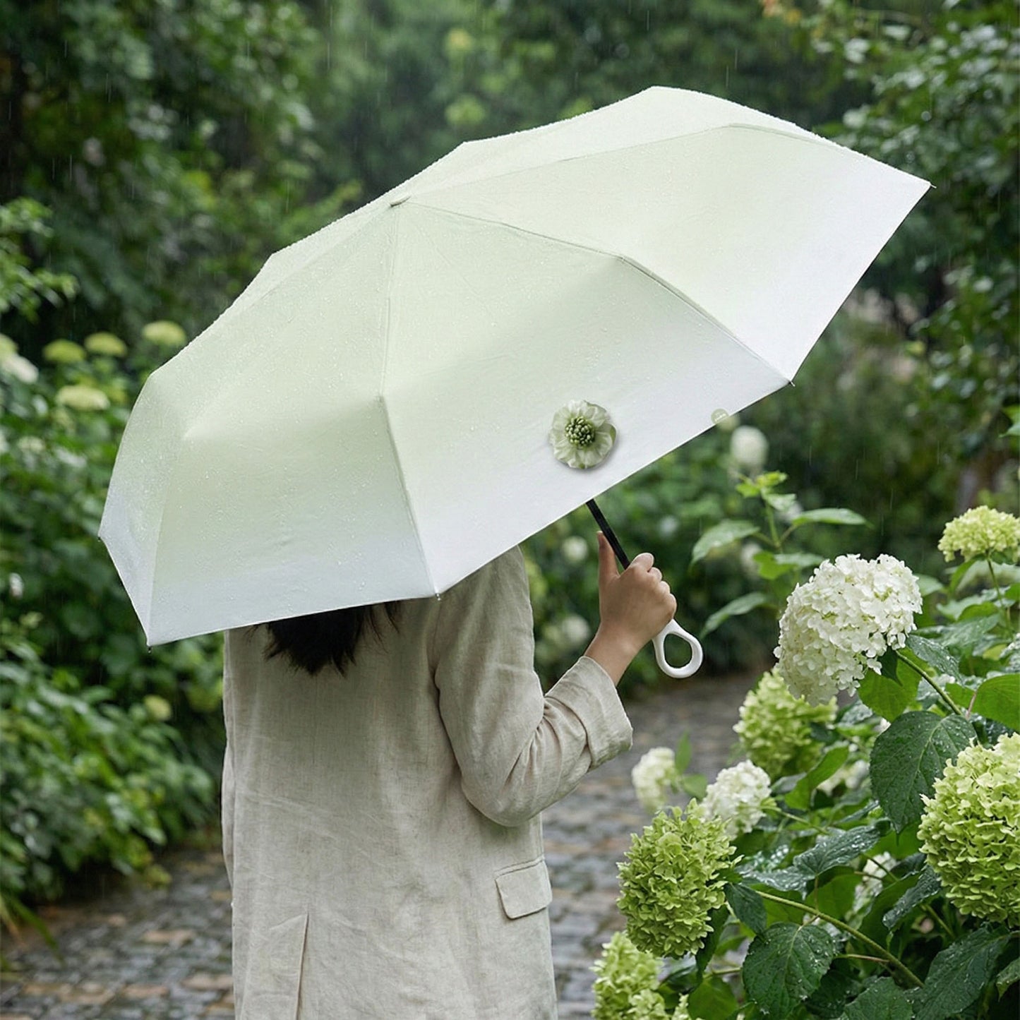 Gradient-Colored Umbrella with Floral Accent and Curved Handle