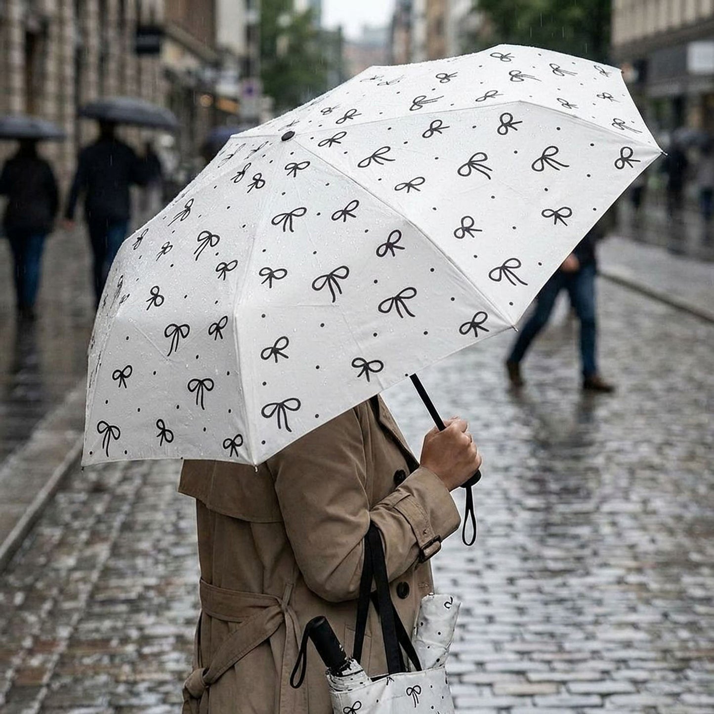 Compact Folding Umbrella with Bow Print Canopy Automatic Open Wind Resistant Frame and Strap