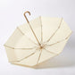 Floral Print Folding Umbrella with Gold Tone Frame Curved Handle and Matching Sleeve