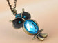 Blue Zircon Owl Perched Tree Branch Pendant Necklace