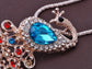 Swarovski Crystal Faux Pearl Light Blue Feather Peacock Pendant Necklace