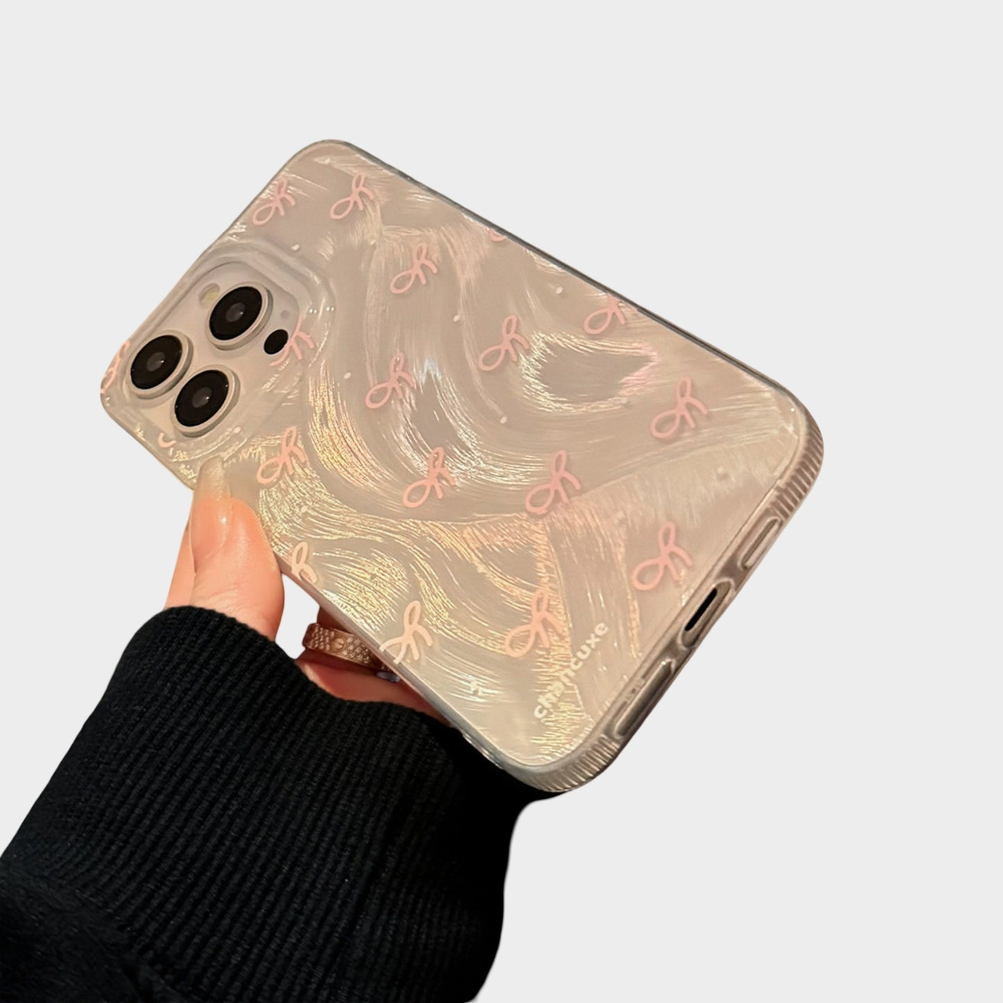 Bow Accent Phone Case with Textured Wave Pattern and Raised Bow Details
