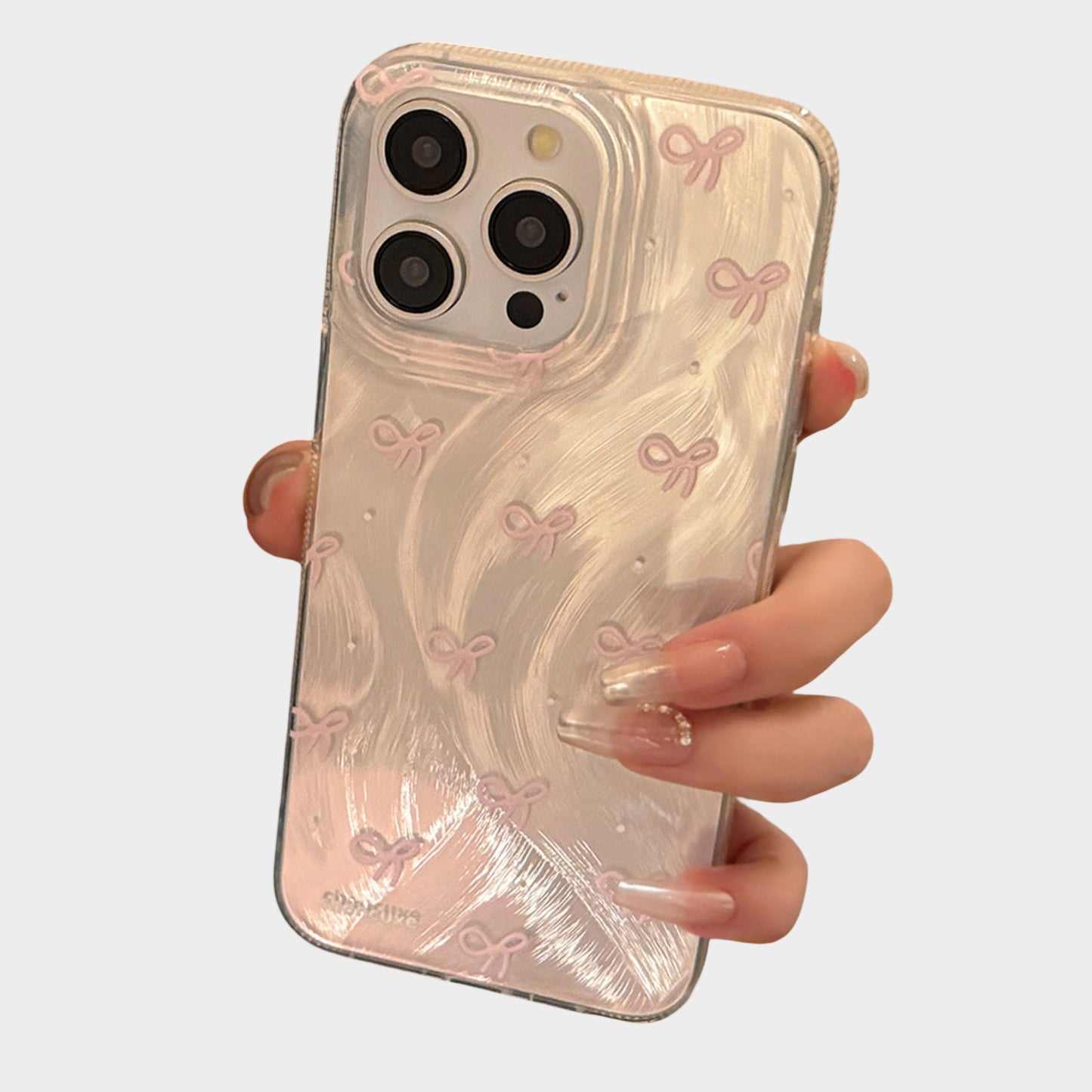 Bow Accent Phone Case with Textured Wave Pattern and Raised Bow Details