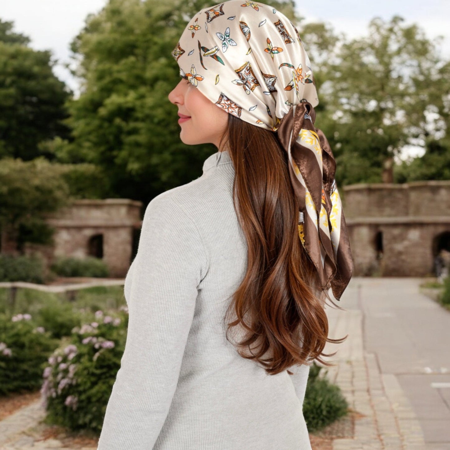 Vintage-Inspired Satin Square Scarves with Vibrant Patterns and Bold Feather and Butterfly Motifs