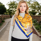 Vintage-Inspired Satin Square Scarves with Vibrant Patterns and Bold Feather and Butterfly Motifs