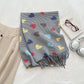 Heart Pattern Soft Knit Scarf with Delicate Fringe Edges and Lightweight Cozy Texture Designed for Gentle Everyday Comfort