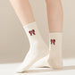 4 Pairs Striped and Solid Knit Socks with Bow Embroidery Ribbed Cuffs and Soft Stretch Fabric