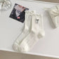 6-Pack Ruffle Trim Crew Socks with Ribbed Texture and Delicate Bow Accent
