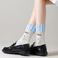 2-Pair Ruffle Cuff Crew Socks with Soft Knit Fabric Playful Character Pattern and Stretch Fit