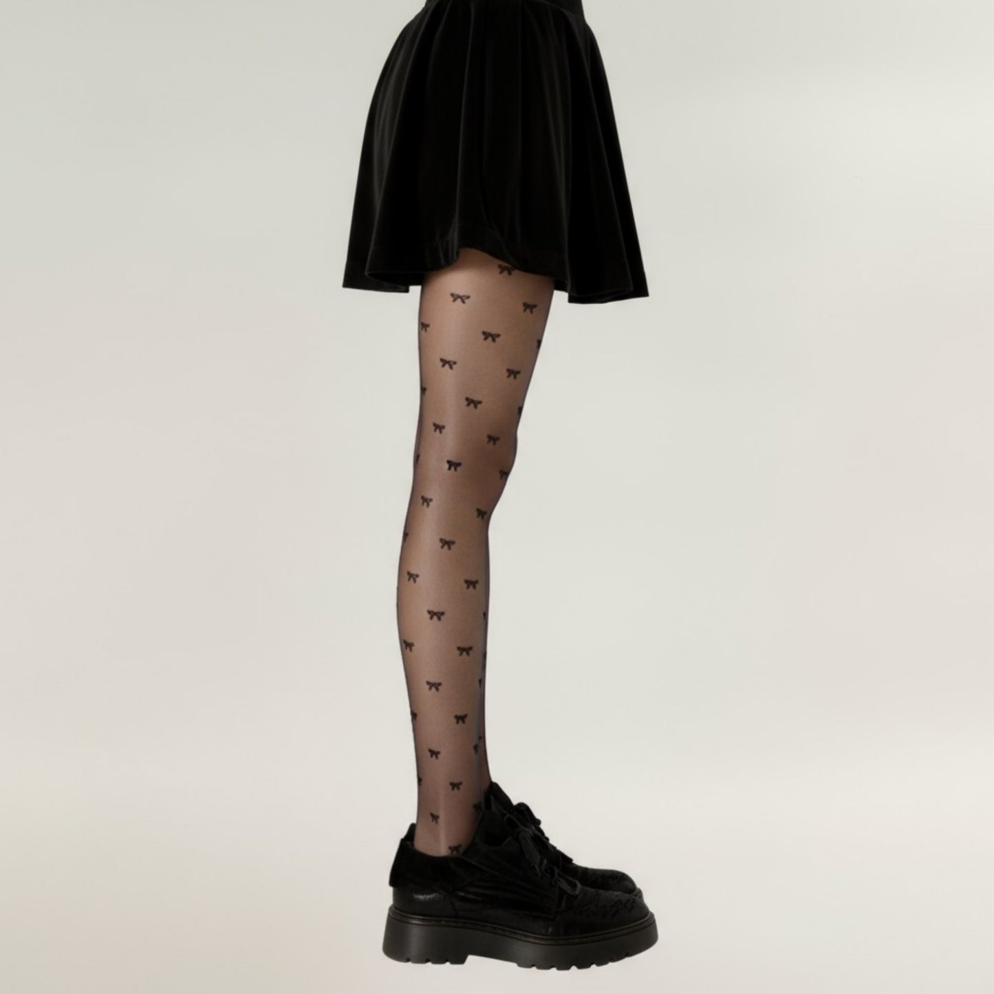 Sheer Tights with Allover Bow Pattern Design