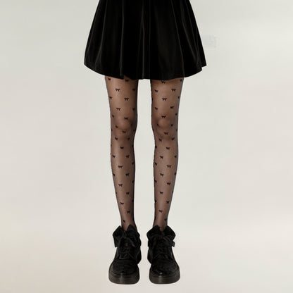 Sheer Tights with Allover Bow Pattern Design