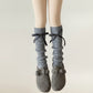 Ribbed Knit Leg Warmers with Decorative Ribbon Bow Detail and Soft Stretch Fit for Cozy Feminine Layered Styling