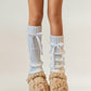 Ribbed Knit Leg Warmers with Decorative Ribbon Bow Detail and Soft Stretch Fit for Cozy Feminine Layered Styling