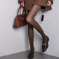Sheer Vertical Stripe Tights with Soft Stretch Fit and Subtle Shimmer Finish