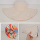 Wide Brim Floppy Sun Hat with Colorful Printed Underside UV Protection Lightweight Foldable Design for Outdoor Use