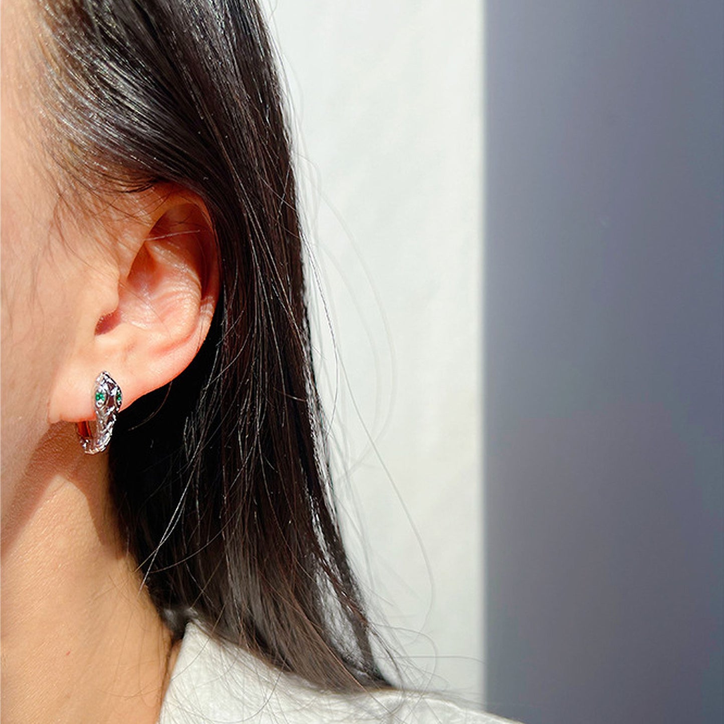 Snake-Shaped Hoop Earrings with Green Gem Eyes