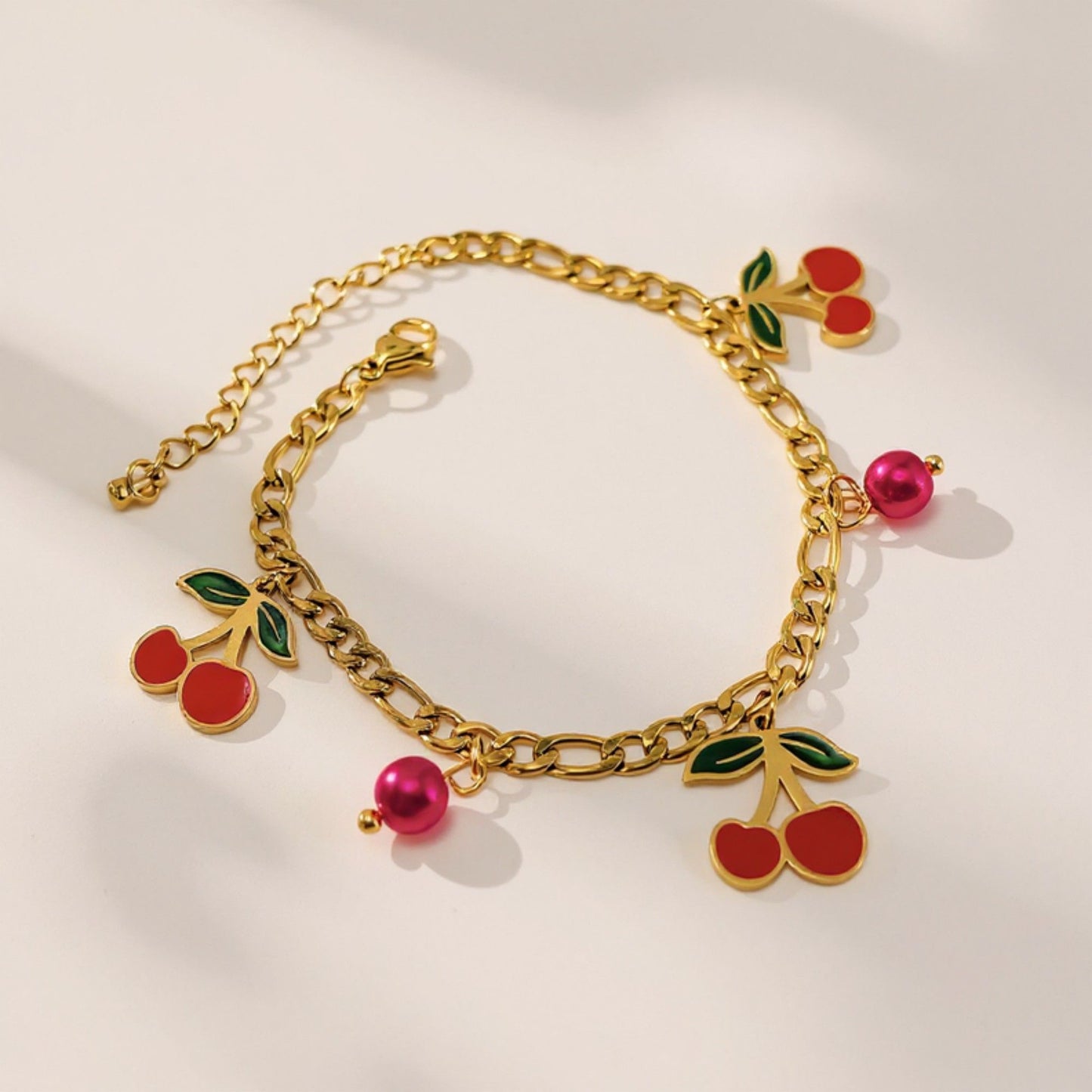 Cherry Charm Bracelet with Double Chain Links and Playful Fruit-Themed Pendants for a Cute Whimsical Accessory Style