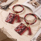 Womens Snakeskin Print Wristlet Keychain with Mini Pouch and Tassel