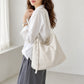 Herringbone Tote Bag with Adjustable Strap and Rivet Detail