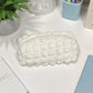 Whipped Cream-Inspired Zipper Pouch with Soft Sculpted Texture and Compact Storage Design
