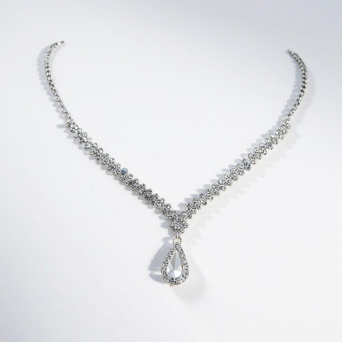 Women's Rhinestone Necklace with Teardrop Crystal Pendant and V-Shaped Chain Design