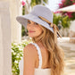 Wide Brim Sun Hat with Bow Accent Stitched Crown and Soft Structured Brim