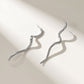 Wavy Metal Drop Earrings with Sculpted Curved Silhouette and Sleek Minimalist Design for a Modern Artistic Statement Look