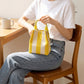 Small Striped Knit Bucket Bag with Rope Handles and Snap Closure