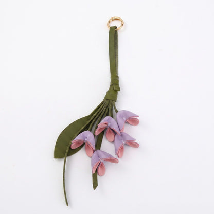 Floral Bag Charm with Tassel Strap and Gold Tone Ring