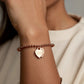 Beaded Bracelet with Dual Heart Charms Elegant Polished Metal Accents Adjustable Chain Detail for a Refined Valentine Look