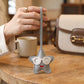 2-Piece Womens Faux Leather Bag Charm with Long Hanging Strap and Layered Detail