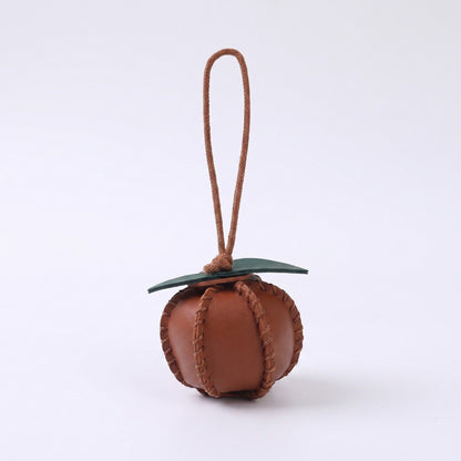 2-Piece Womens Faux Leather Bag Charm with Cord Loop Leaf Accent and Textured Stitch Detail