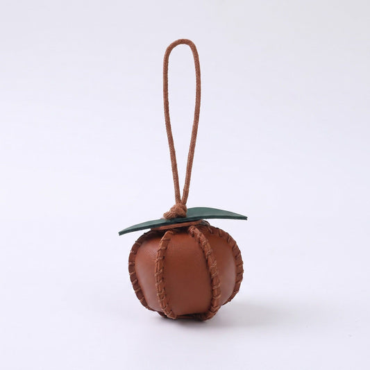 2-Piece Womens Faux Leather Bag Charm with Cord Loop Leaf Accent and Textured Stitch Detail