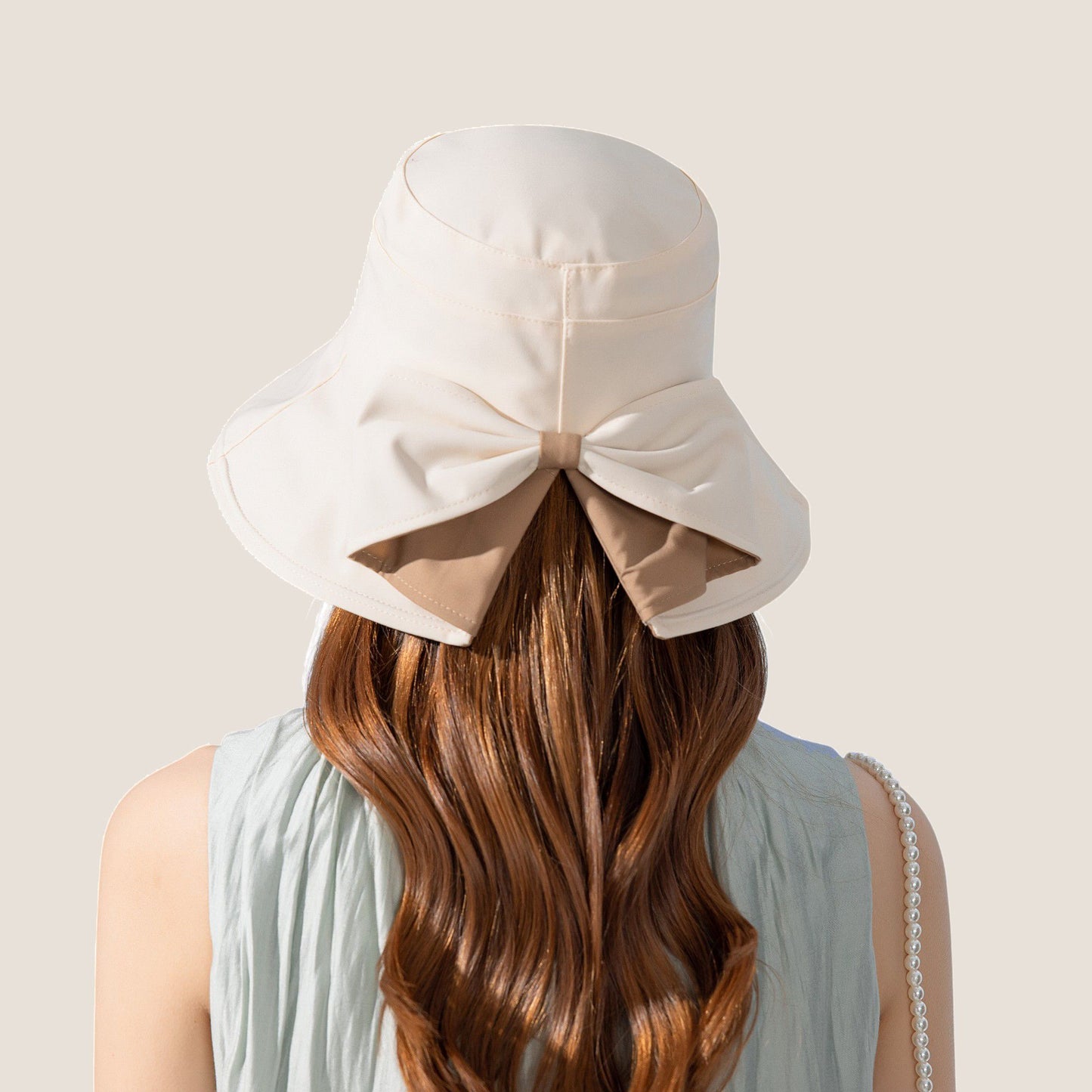 Wide Brim Bucket Hat Back Bow Detail for Sun Protection and Stylish Summer Looks