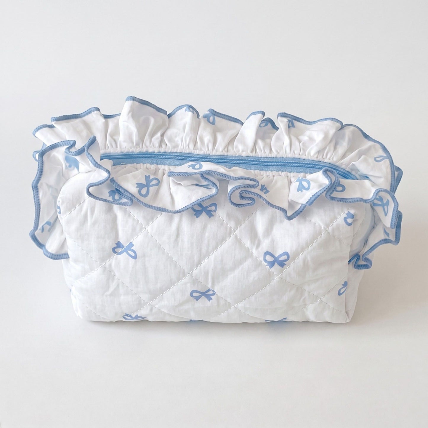 Womens Quilted Bow Print Cosmetic Bag with Ruffle Trim