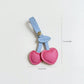 2-Piece Womens Padded Bag Charm with Hanging Strap and Stitched Detail